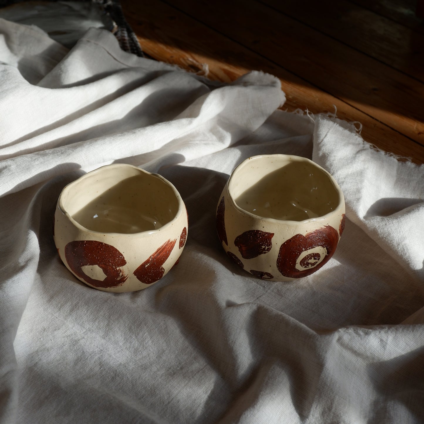 Ceremonial cups decorated with wild clay