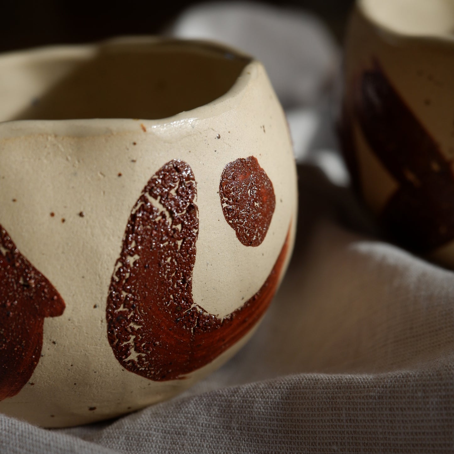 Ceremonial cups decorated with wild clay