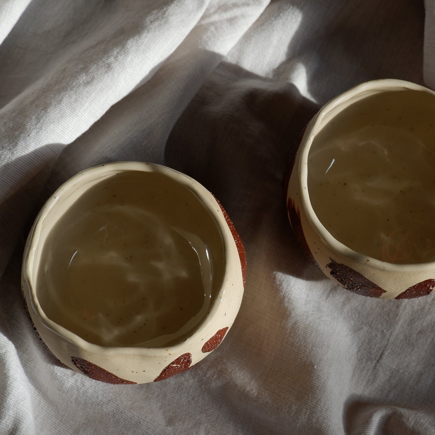 Ceremonial cups decorated with wild clay