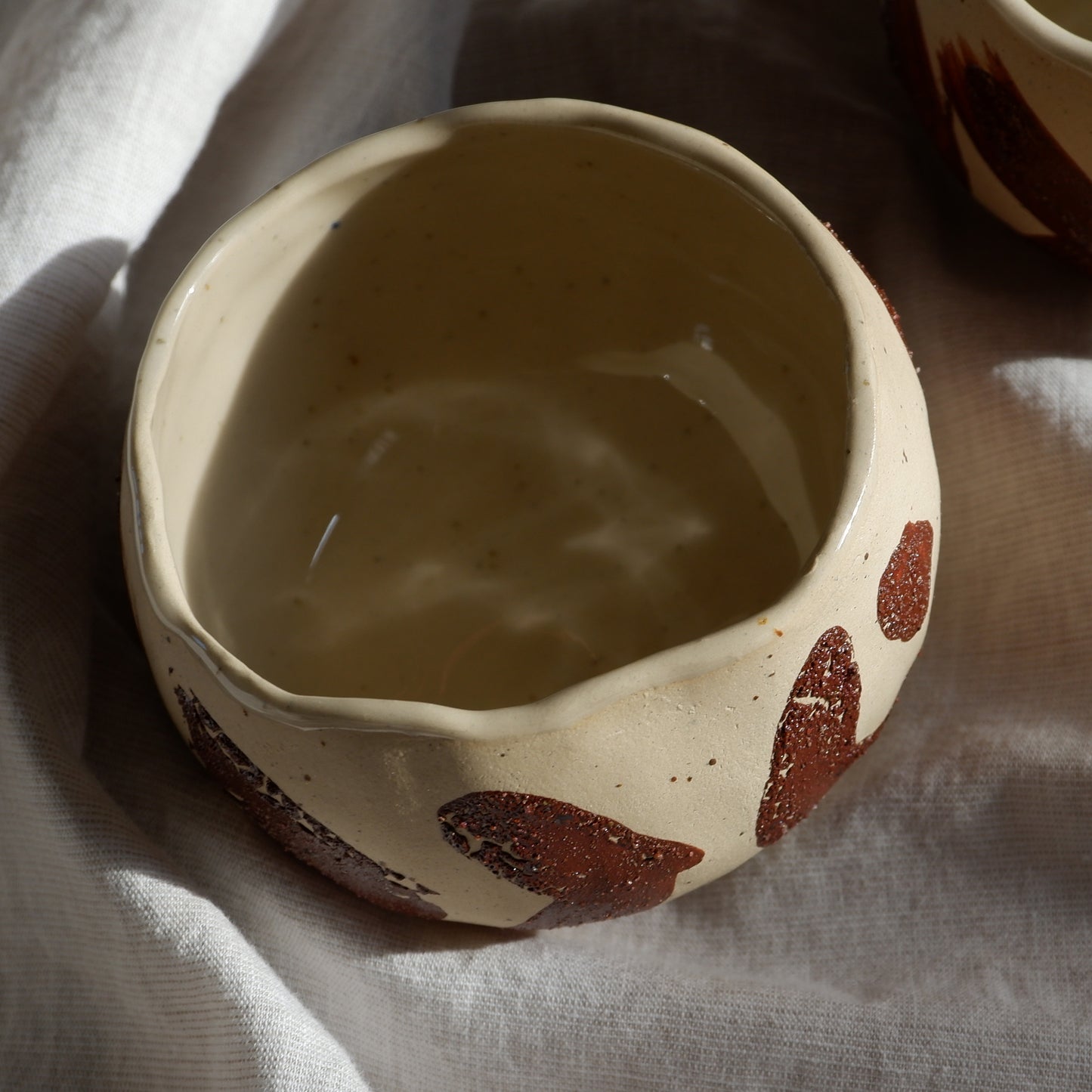 Ceremonial cups decorated with wild clay