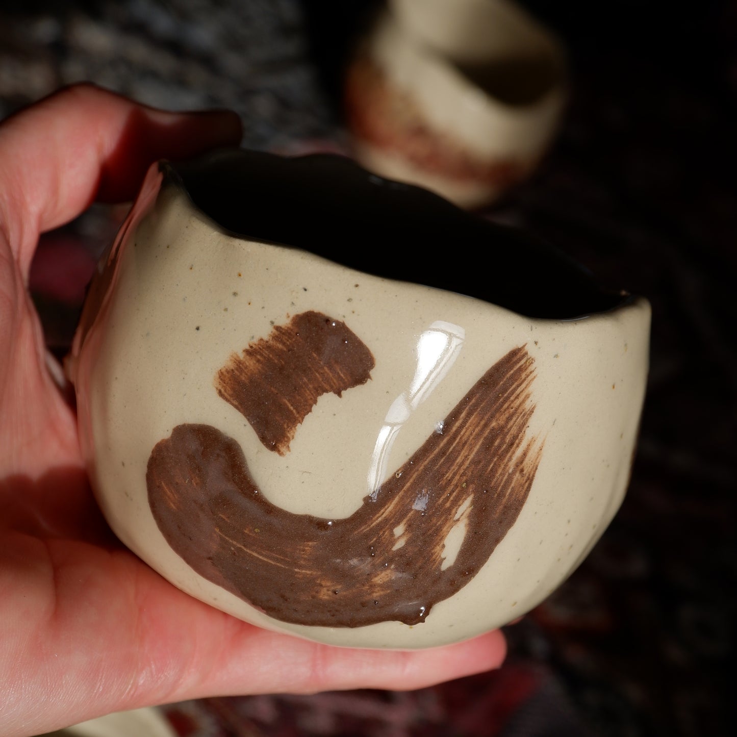 Ceremonial cup with brown decoration