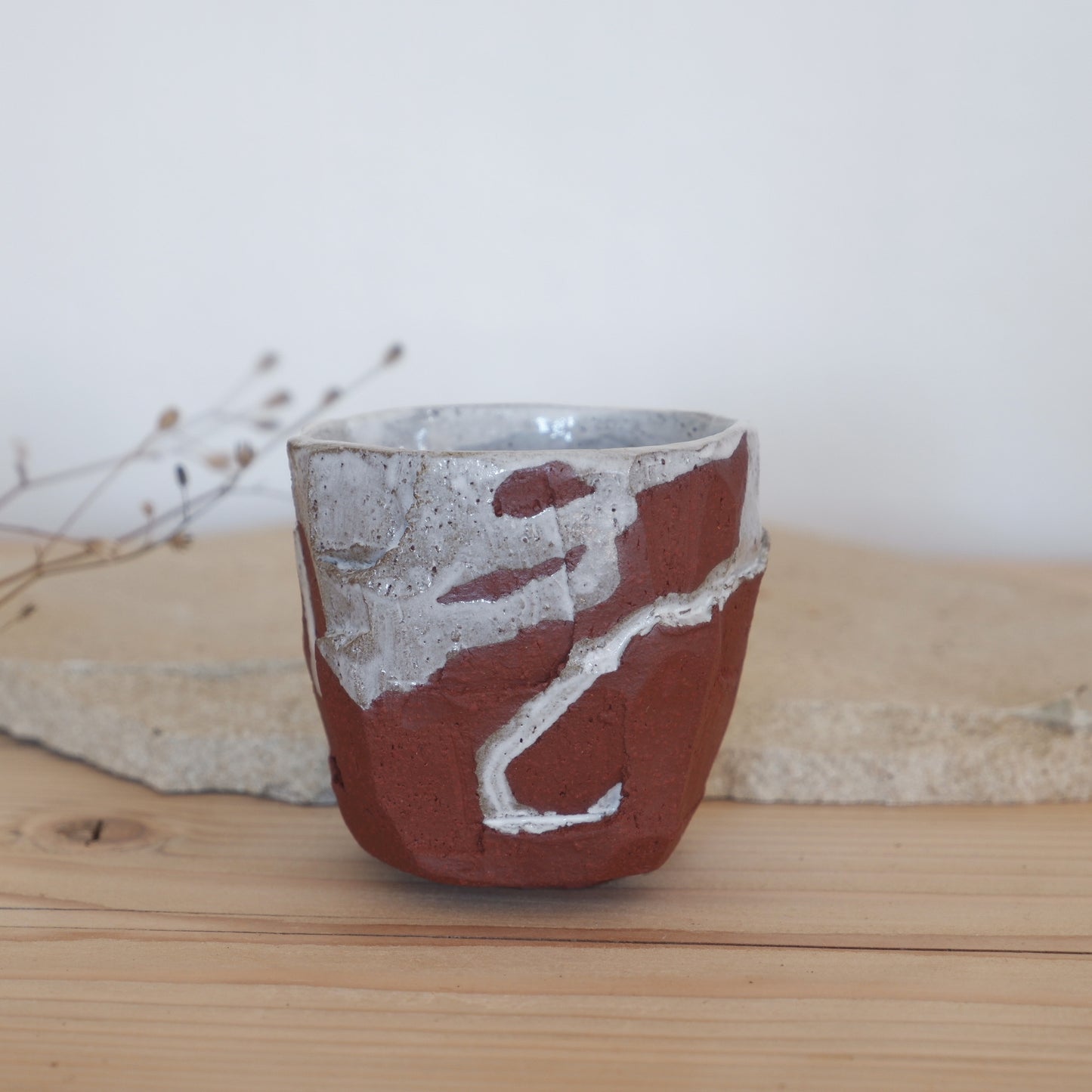 Ourea red clay cup with white glaze